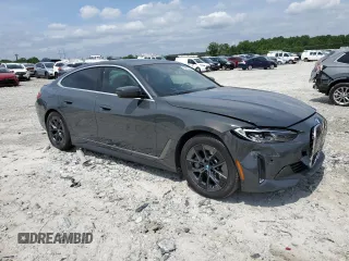2023 BMW i4 eDrive40 with VIN WBY73AW03PFN64332, listed as a Copart auction lot 54061254 with 31,138 mi miles. Bid and sale history available at carsss.com. Image 4.