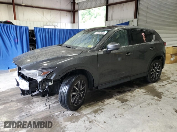 2018 Mazda CX-5 Grand Touring with VIN JM3KFBDM1J0440849, listed as a Copart auction lot 58354655 with 43,348 mi miles and Salvage title. Bid and sale history available at DreamBid. Image 1.