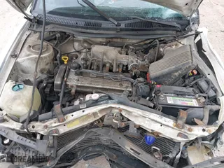 1997 Geo Prizm LSi with VIN 1Y1SK5266VZ417087, listed as a IAAI auction lot 42009913 with 198,041 mi miles. Bid and sale history available at carsss.com. Image 10.