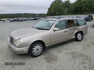 1999 Mercedes-Benz E-Class with VIN WDBJH65F9XA880146, listed as a Copart auction lot 72306164 with 192,442 mi miles and Salvage Title. Bid and sale history available at carsss.com. Image 1.