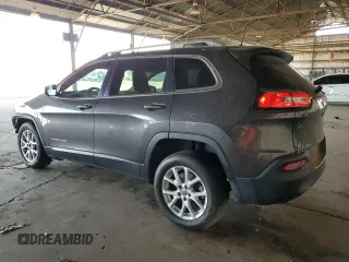 2016 Jeep Cherokee Latitude with VIN 1C4PJLCS8GW107783, listed as a Copart auction lot 64771655 with 108,745 mi miles and Salvage title. Bid and sale history available at DreamBid. Image 2.