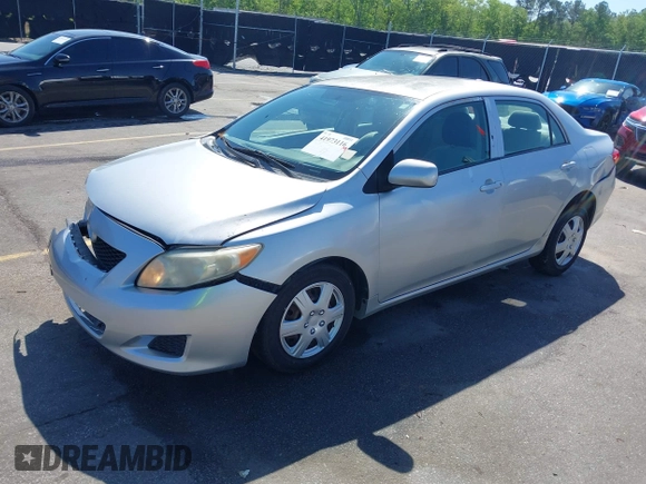 2009 Toyota Corolla with VIN 1NXBU40E99Z100681, listed as a IAAI auction lot 41973116 with 119,744 mi miles. Bid and sale history available at carsss.com. Image 17.