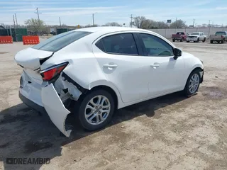 2017 Toyota Yaris iA with VIN 3MYDLBYV9HY185026, listed as a IAAI auction lot 41834005 with 57,025 mi miles. Bid and sale history available at carsss.com. Image 4.