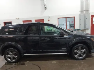 2015 Dodge Journey Crossroad with VIN 3C4PDCGG8FT740981, listed as a IAAI auction lot 41582710 with 185,938 mi miles and . Bid and sale history available at DreamBid. Image 13.