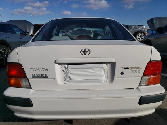 1995 Toyota Tercel DX with VIN JT2EL56D2S0027328, listed as a Copart auction lot 87222704 with 106,601 mi miles and Clean Title. Bid and sale history available at carsss.com. Image 6.