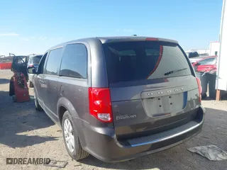 2018 Dodge Grand Caravan SE with VIN 2C4RDGBG3JR348560, listed as a IAAI auction lot 41657312 with 135,007 mi miles. Bid and sale history available at carsss.com. Image 3.