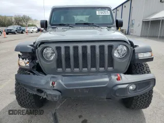 2023 Jeep Wrangler Rubicon with VIN 1C4JJXFG4PW523432, listed as a Copart auction lot 51642975 with 23,631 mi miles and Salvage title. Bid and sale history available at DreamBid. Image 5.