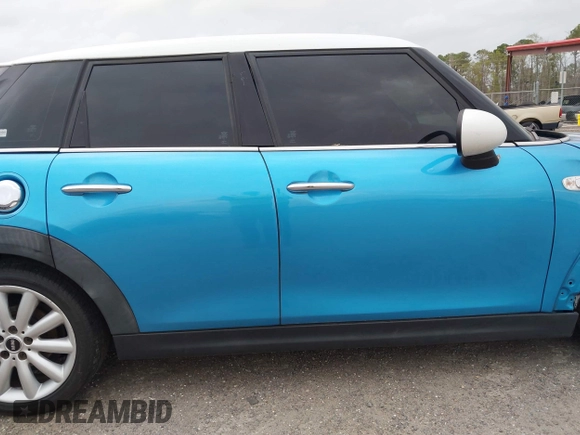2017 MINI Hardtop 4 Door Cooper S z VIN WMWXU3C37H2F48944, wystawiony jako IAAI lot #41732140 z przebiegiem 154 563 mil mil oraz . Historia ofert i sprzedaży dostępna na DreamBid. Obrazek 13.