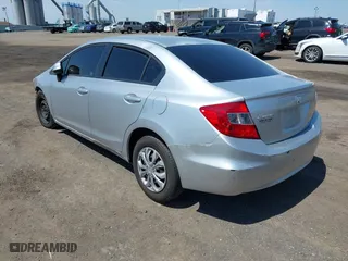 2012 Honda Civic Sdn LX with VIN 2HGFB2F56CH314403, listed as a IAAI auction lot 42079018 with 103,153 mi miles. Bid and sale history available at carsss.com. Image 3.