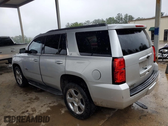 2016 Chevrolet Tahoe LT with VIN 1GNSCBKC1GR352407, listed as a Copart auction lot 58039245 with 150,744 mi miles and Salvage title. Bid and sale history available at DreamBid. Image 2.