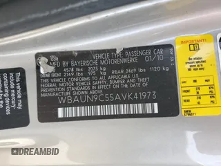 2010 BMW 1 Series 135i with VIN WBAUN9C55AVK41973, listed as a Copart auction lot 54609015 with 144,685 mi miles and Salvage Title. Bid and sale history available at carsss.com. Image 12.