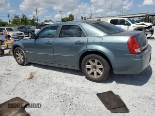 2005 Chrysler 300 Touring z VIN 2C3JA53G95H546536, wystawiony jako Copart lot #60667575 z przebiegiem 163 625 mil mil oraz Szkoda całkowita • Salvage title. Historia ofert i sprzedaży dostępna na DreamBid. Obrazek 2.