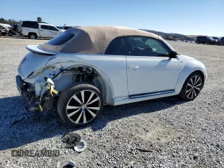 2015 Volkswagen Beetle with VIN 3VW7S7AT1FM818382, listed as a Copart auction lot 41666205 with 47,429 mi miles and Salvage Title. Bid and sale history available at DreamBid. Image 3.