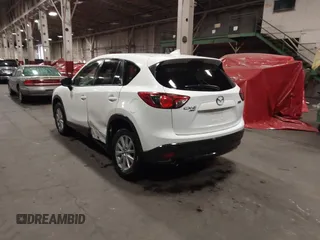 2016 Mazda CX-5 Touring z VIN JM3KE4CY0G0853261, wystawiony jako IAAI lot #41861176 z przebiegiem 63 491 mil mil oraz . Historia ofert i sprzedaży dostępna na DreamBid. Obrazek 3.