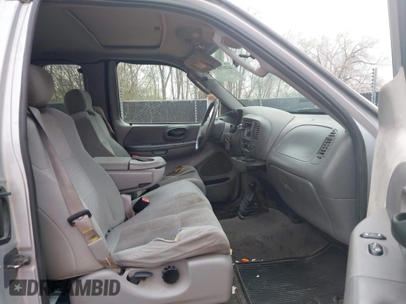 2003 Ford F-150 XL with VIN 1FTRX18L13NA95540, listed as a IAAI auction lot 41879632 with 1 mi miles. Bid and sale history available at carsss.com. Image 5.