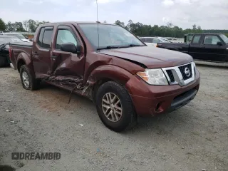 2017 Nissan Frontier SV with VIN 1N6DD0ER5HN700802, listed as a Copart auction lot 57764685 with 121,473 mi miles and Salvage title. Bid and sale history available at DreamBid. Image 4.