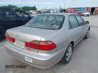 1999 Honda Accord LX with VIN JHMCG5642XC003361, listed as a IAAI auction lot 42270009 with 160,706 mi miles and . Bid and sale history available at DreamBid. Image 4.