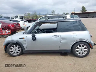 2004 MINI Hardtop with VIN WMWRC33434TJ57506, listed as a IAAI auction lot 42117581 with 148,483 mi miles and . Bid and sale history available at DreamBid. Image 14.