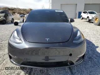 2024 Tesla Model Y Performance z VIN 7SAYGDEF6RF166365, wystawiony jako Copart lot #48885585 z przebiegiem Nie podano mil oraz Szkoda całkowita • Salvage title. Historia ofert i sprzedaży dostępna na DreamBid. Obrazek 5.