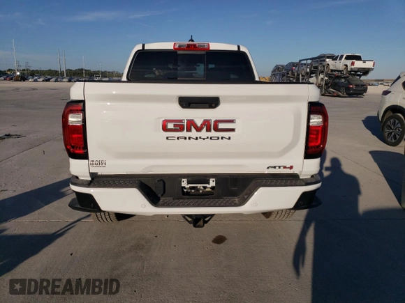 2023 GMC Canyon 4WD AT4 with VIN 1GTP6DEK6P1237045, listed as a Copart auction lot 74981784 with 18,036 mi miles and Salvage Title. Bid and sale history available at carsss.com. Image 6.