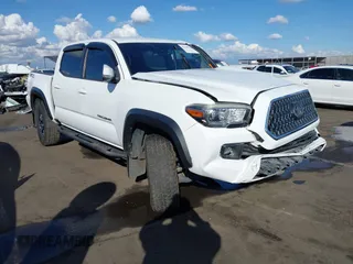2018 Toyota Tacoma SR5 with VIN 3TMAZ5CN4JM053345, listed as a IAAI auction lot 41448361 with 67,245 mi miles and . Bid and sale history available at DreamBid. Image 1.