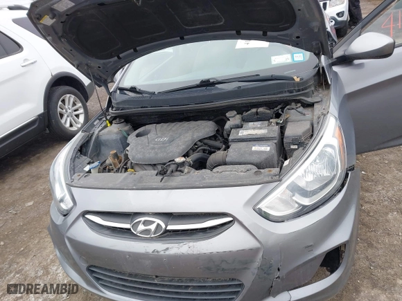 2015 Hyundai Accent GLS with VIN KMHCT4AE0FU929088, listed as a IAAI auction lot 41993359 with 149,958 mi miles. Bid and sale history available at carsss.com. Image 10.
