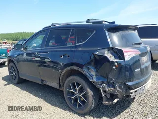 2018 Toyota RAV4 Hybrid SE with VIN JTMJJREV9JD191552, listed as a IAAI auction lot 42158665 with 84,025 mi miles and . Bid and sale history available at DreamBid. Image 3.