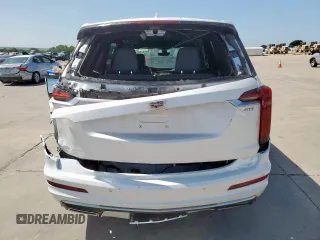 2024 Cadillac XT6 FWD Premium Luxury with VIN 1GYKPCRS7RZ711983, listed as a Copart auction lot 64842625 with 6,394 mi miles and Clean title. Bid and sale history available at DreamBid. Image 6.