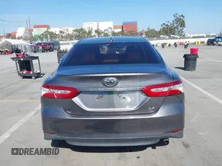2019 Toyota Camry LE with VIN 4T1B11HK2KU240465, listed as a IAAI auction lot 42095075 with 67,852 mi miles and . Bid and sale history available at DreamBid. Image 17.