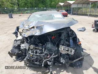 2019 Honda Civic EX z VIN JHMFC1F37KX008758, wystawiony jako IAAI lot #42077196 z przebiegiem Nie podano mil oraz . Historia ofert i sprzedaży dostępna na DreamBid. Obrazek 11.