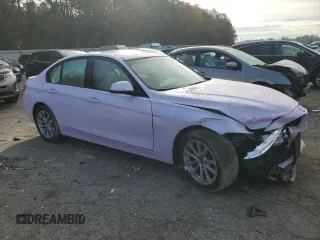 2018 BMW 3 Series 320i with VIN WBA8A9C55JAH12818, listed as a Copart auction lot 52110515 with 72,522 mi miles and Salvage title. Bid and sale history available at DreamBid. Image 4.