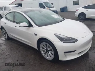2023 Tesla Model 3 with VIN 5YJ3E1EA3PF563707, listed as a IAAI auction lot 41415730 with 18,748 mi miles. Bid and sale history available at carsss.com. Image 1.