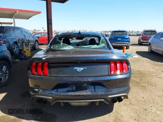 2021 Ford Mustang EcoBoost with VIN 1FA6P8TH2M5104154, listed as a IAAI auction lot 41869810 with 15,561 mi miles and . Bid and sale history available at DreamBid. Image 15.