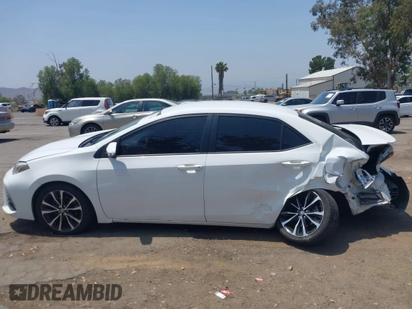 2017 Toyota Corolla L with VIN 5YFBURHE3HP610414, listed as a IAAI auction lot 42410369 with 157,908 mi miles and . Bid and sale history available at DreamBid. Image 14.