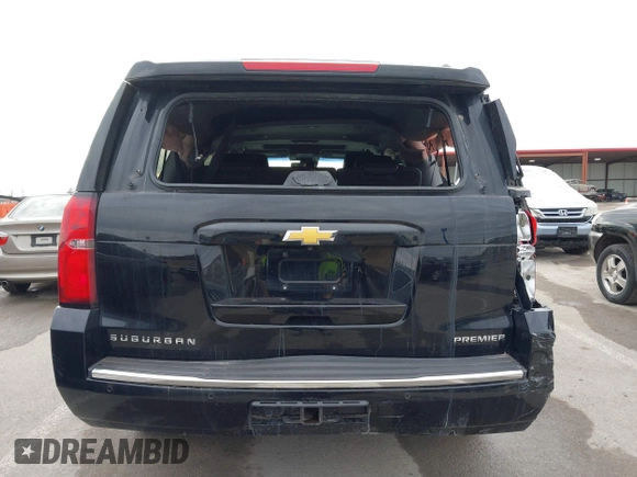 2019 Chevrolet Suburban Premier with VIN 1GNSKJKC7KR261826, listed as a IAAI auction lot 41652451 with 127,032 mi miles and . Bid and sale history available at DreamBid. Image 16.