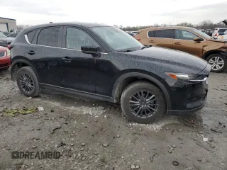 2020 Mazda CX-5 Touring with VIN JM3KFACM1L0793753, listed as a Copart auction lot 50134845 with 106,175 mi miles and Salvage Title. Bid and sale history available at carsss.com. Image 4.