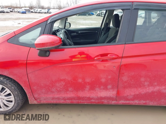 2015 Honda Fit LX z VIN 3HGGK5H54FM728448, wystawiony jako IAAI lot #41538650 z przebiegiem 115 450 mil mil oraz . Historia ofert i sprzedaży dostępna na DreamBid. Obrazek 14.