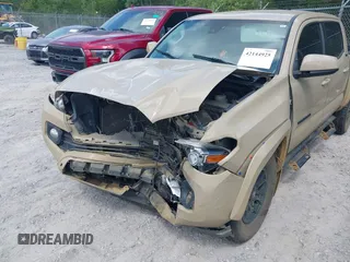 2020 Toyota Tacoma SR5 with VIN 3TMAZ5CN5LM123521, listed as a IAAI auction lot 42144925 with Not provided miles and . Bid and sale history available at DreamBid. Image 6.