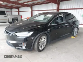 2017 Tesla Model X 90D z VIN 5YJXCAE21HF041207, wystawiony jako IAAI lot #41766065 z przebiegiem Nie podano mil oraz . Historia ofert i sprzedaży dostępna na DreamBid. Obrazek 19.