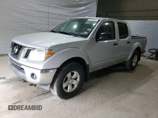 2011 Nissan Frontier Pro-4X with VIN 1N6AD0EV6BC438873, listed as a Copart auction lot 57338405 with 90,077 mi miles and Salvage title. Bid and sale history available at DreamBid. Image 1.