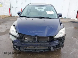2009 Mazda 5 Sport with VIN JM1CR29L890356690, listed as a IAAI auction lot 41169351 with 118,582 mi miles and . Bid and sale history available at DreamBid. Image 6.
