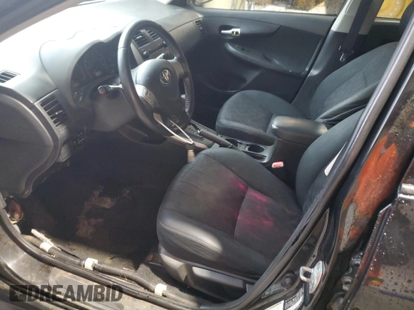 2009 Toyota Corolla with VIN 2T1BU40E19C149746, listed as a Copart auction lot 51160895 with 253,394 mi miles and Salvage Title. Bid and sale history available at carsss.com. Image 7.