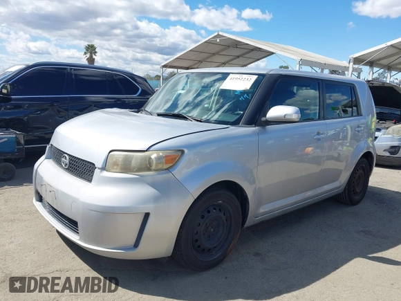 2009 Scion xB with VIN JTLKE50E991081756, listed as a IAAI auction lot 41952232 with 167,079 mi miles. Bid and sale history available at carsss.com. Image 2.