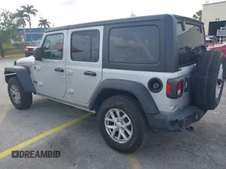 2023 Jeep Wrangler Sport S with VIN 1C4HJXDNXPW702199, listed as a IAAI auction lot 41859413 with 24,942 mi miles and . Bid and sale history available at DreamBid. Image 3.