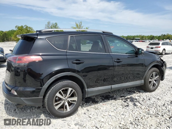 2018 Toyota RAV4 XLE with VIN 2T3WFREV2JW458816, listed as a Copart auction lot 53235105 with 135,469 mi miles and Salvage Title. Bid and sale history available at DreamBid. Image 3.
