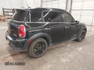 2012 MINI Countryman S z VIN WMWZC5C57CWL55975, wystawiony jako IAAI lot #42155876 z przebiegiem 126 637 mil mil oraz . Historia ofert i sprzedaży dostępna na DreamBid. Obrazek 4.