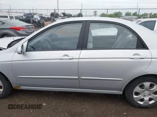 2006 Kia Spectra EX z VIN KNAFE121265360130, wystawiony jako IAAI lot #42345843 z przebiegiem 152 987 mil mil oraz . Historia ofert i sprzedaży dostępna na DreamBid. Obrazek 14.