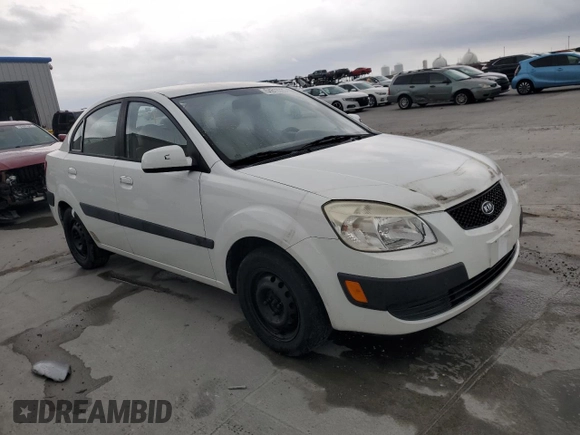 2009 Kia Rio LX with VIN KNADE223X96439445, listed as a Copart auction lot 54619335 with 102,120 mi miles and Salvage Title. Bid and sale history available at DreamBid. Image 4.