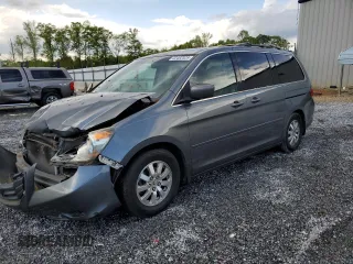 2010 Honda Odyssey EX-L with VIN 5FNRL3H73AB099787, listed as a Copart auction lot 52482325 with 235,785 mi miles and Salvage Title. Bid and sale history available at DreamBid. Image 1.