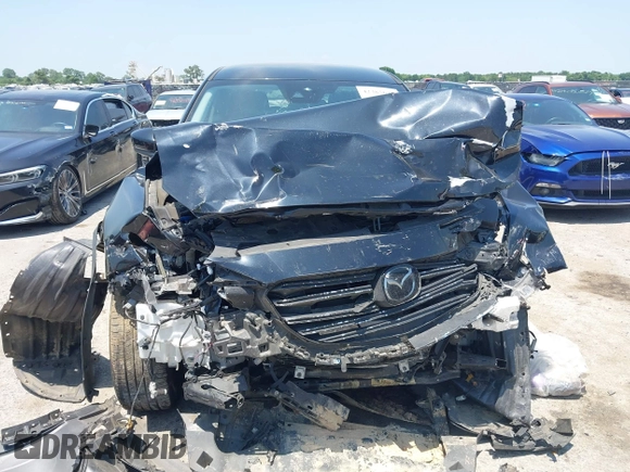 2021 Mazda CX-9 Touring with VIN JM3TCBCY8M0514905, listed as a IAAI auction lot 42385627 with 72,610 mi miles and . Bid and sale history available at DreamBid. Image 12.